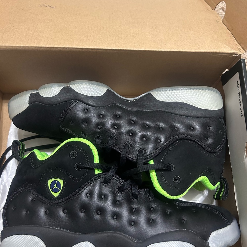 Jordan Jumpman team II. Black with lime green. Worn once. Size 7 youth.